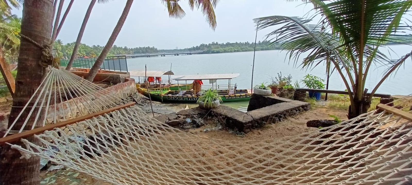 Green Island Homestay Riverside โคชิโคด ภายนอก รูปภาพ